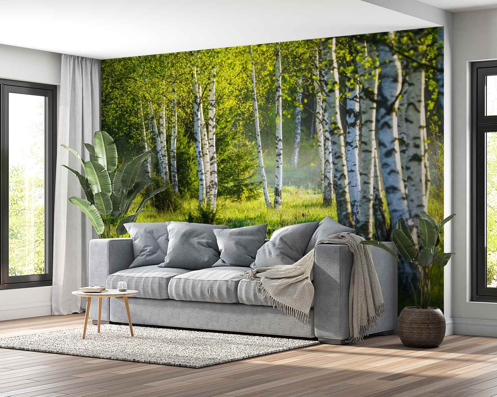 Papier peint Les prairies ornées de bouleaux majestueux sont peintes en vert vif.