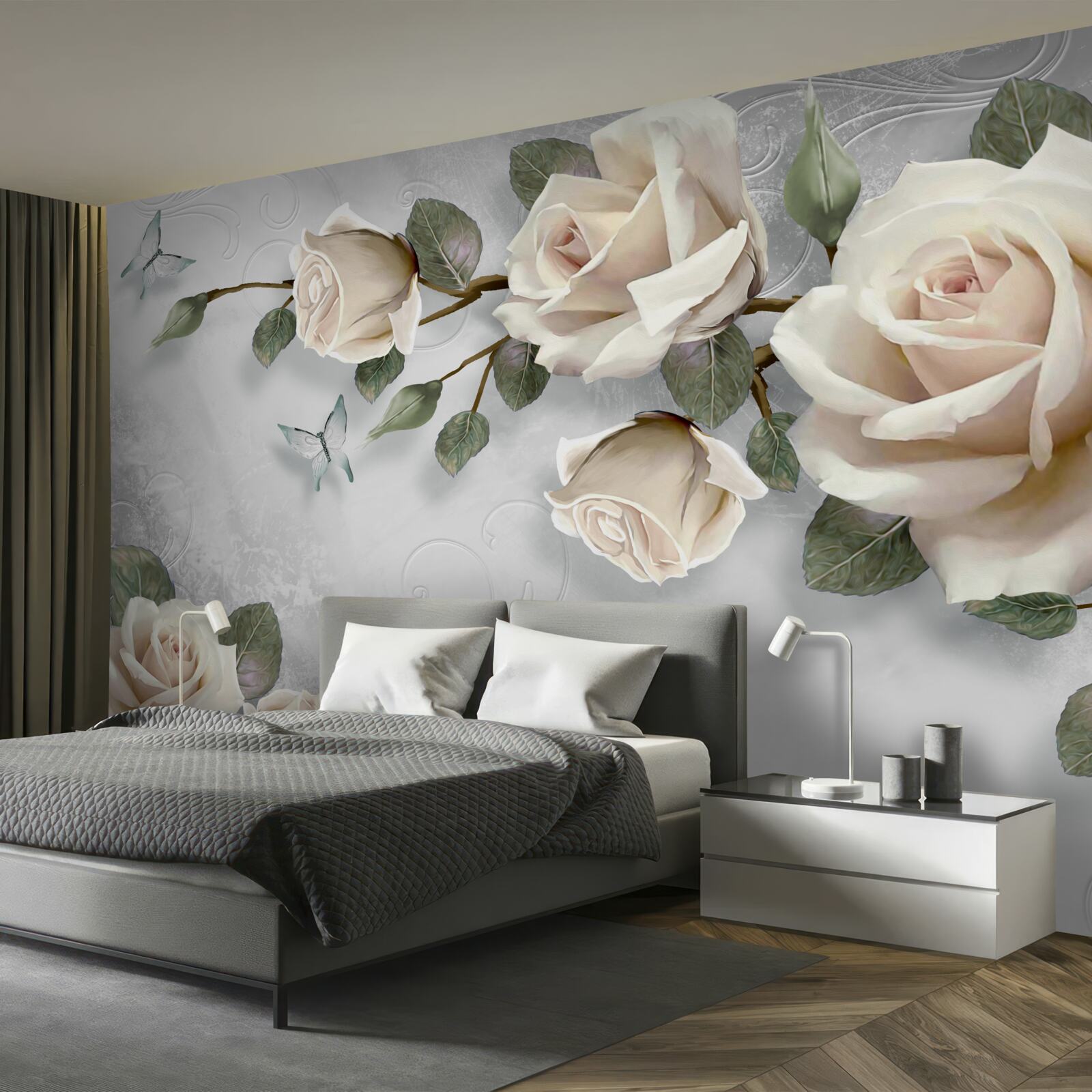 Papier peint les branches d'une rose délicatement fleurie