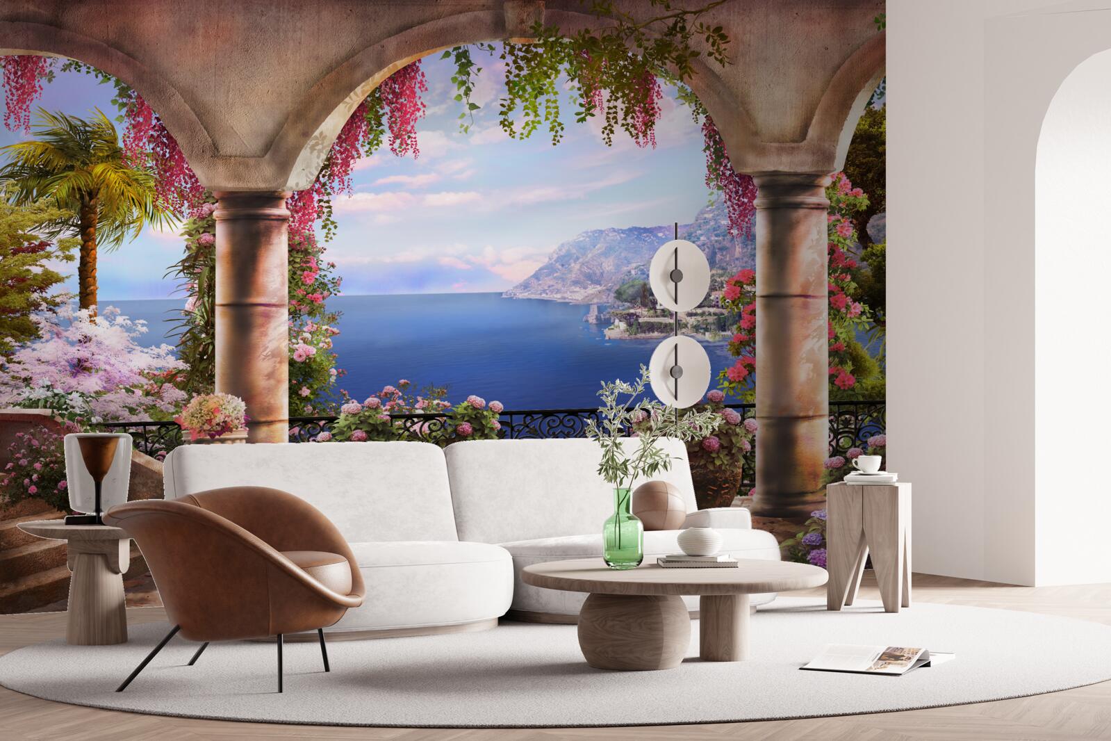 Papier peint Des arches en pierre sont situées près des rives de la mer bleue.