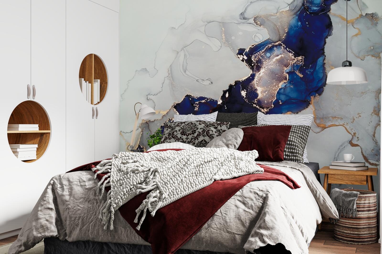 Papier peint bordure dorée sur fond de taches bleues