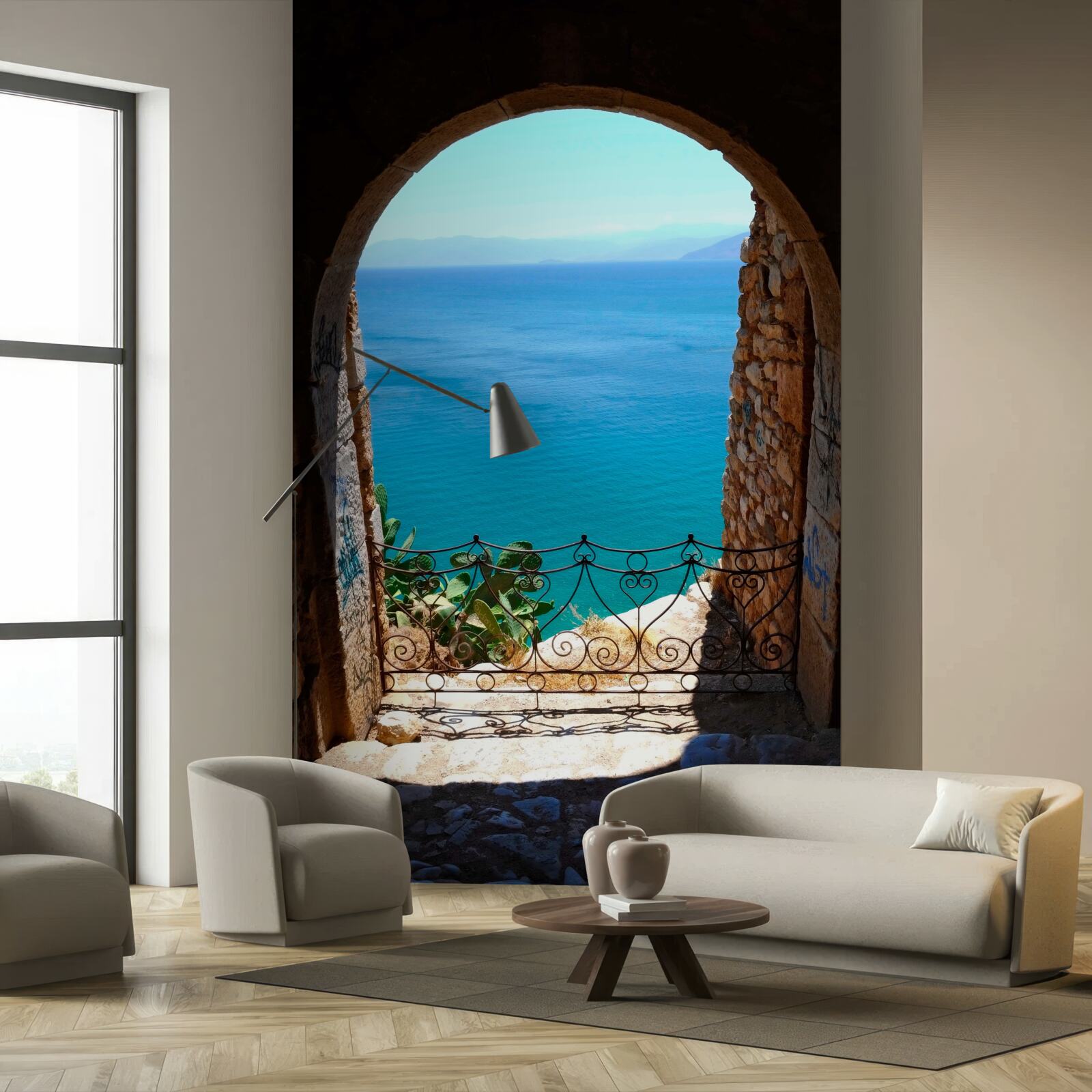 Papier peint arche de pierre menant à la mer