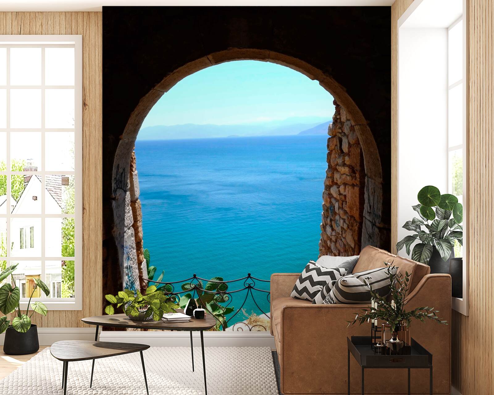 Papier peint arche de pierre menant à la mer