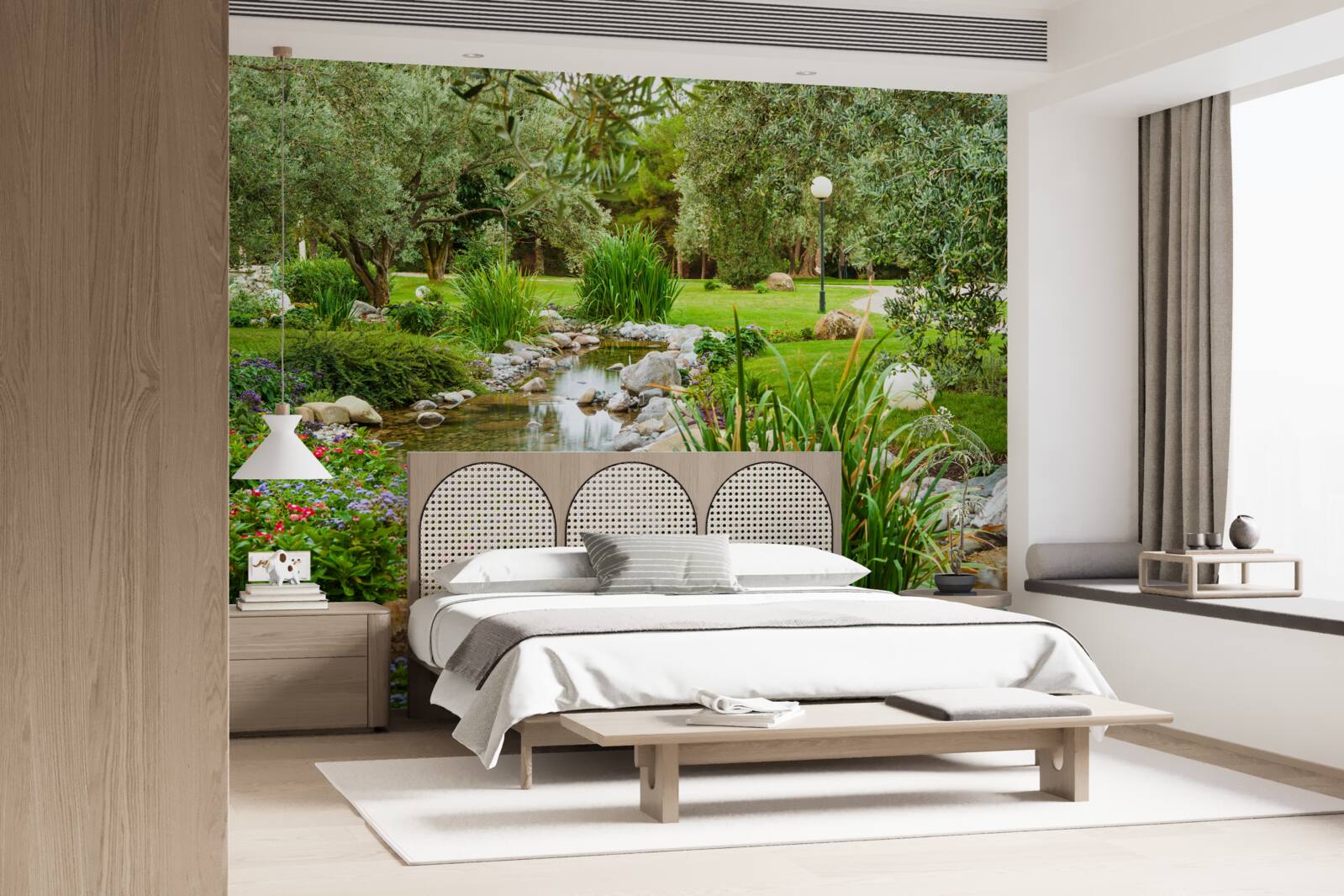 Papier peint un ruisseau qui coule dans une prairie verdoyante