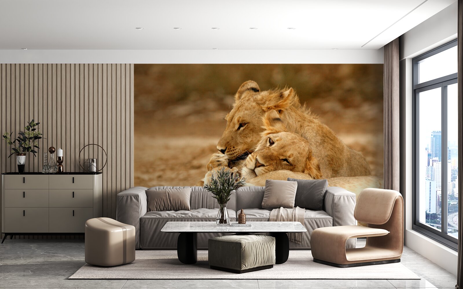 Papier peint une famille de lions s'est installée sur une surface sablonneuse