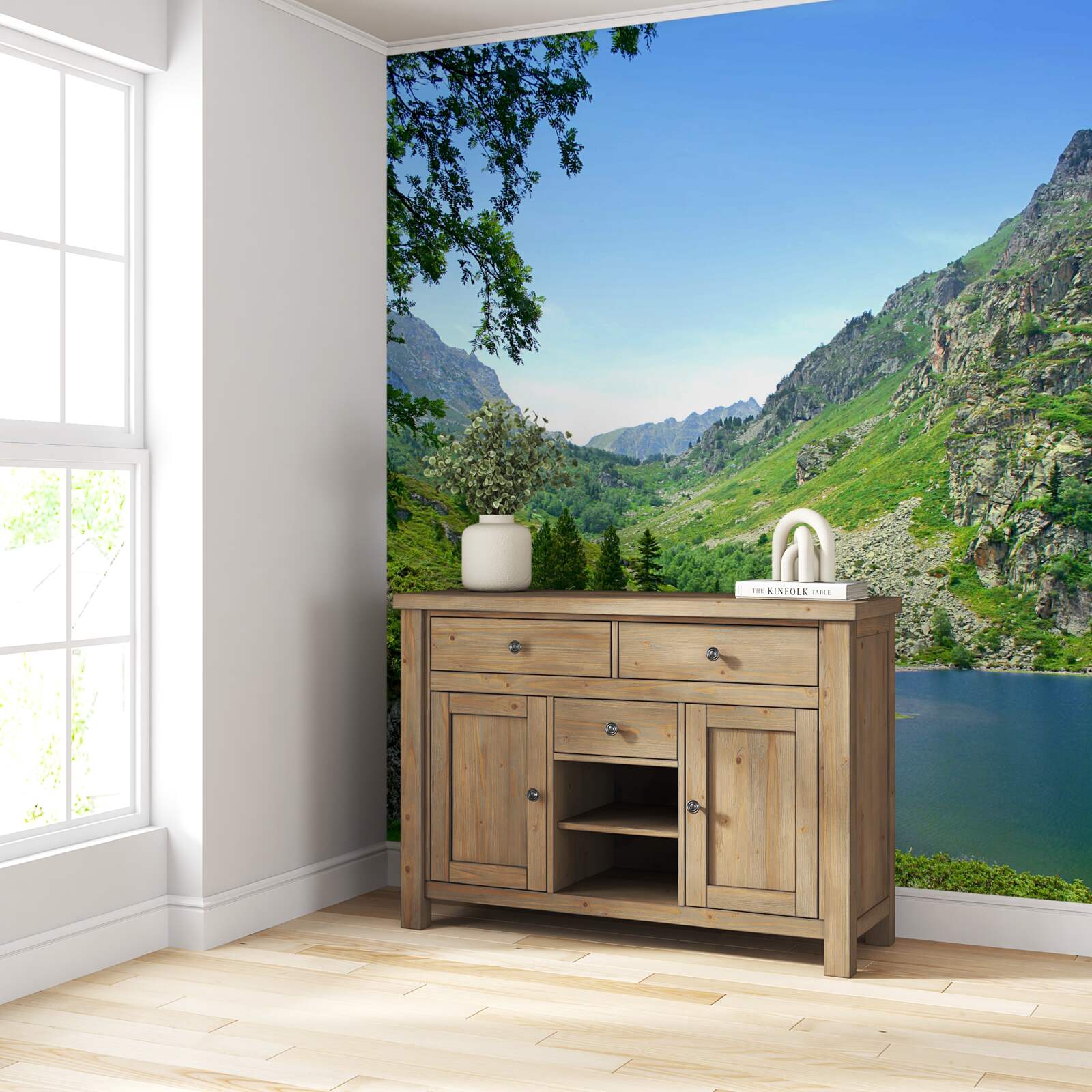 Papier peint un lac entouré de montagnes et de verdure