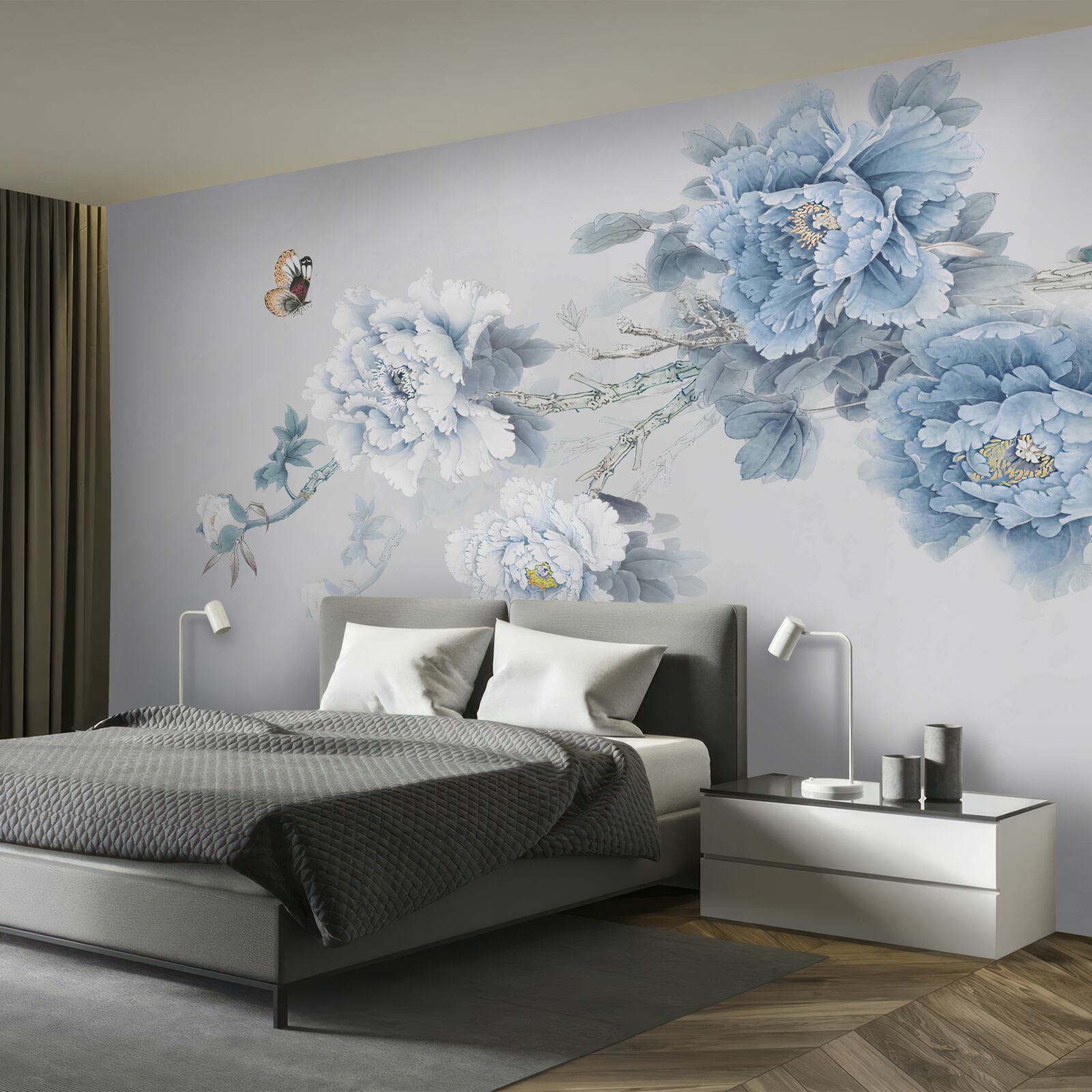 Papier peint un papillon se pose près des branches des fleurs épanouies