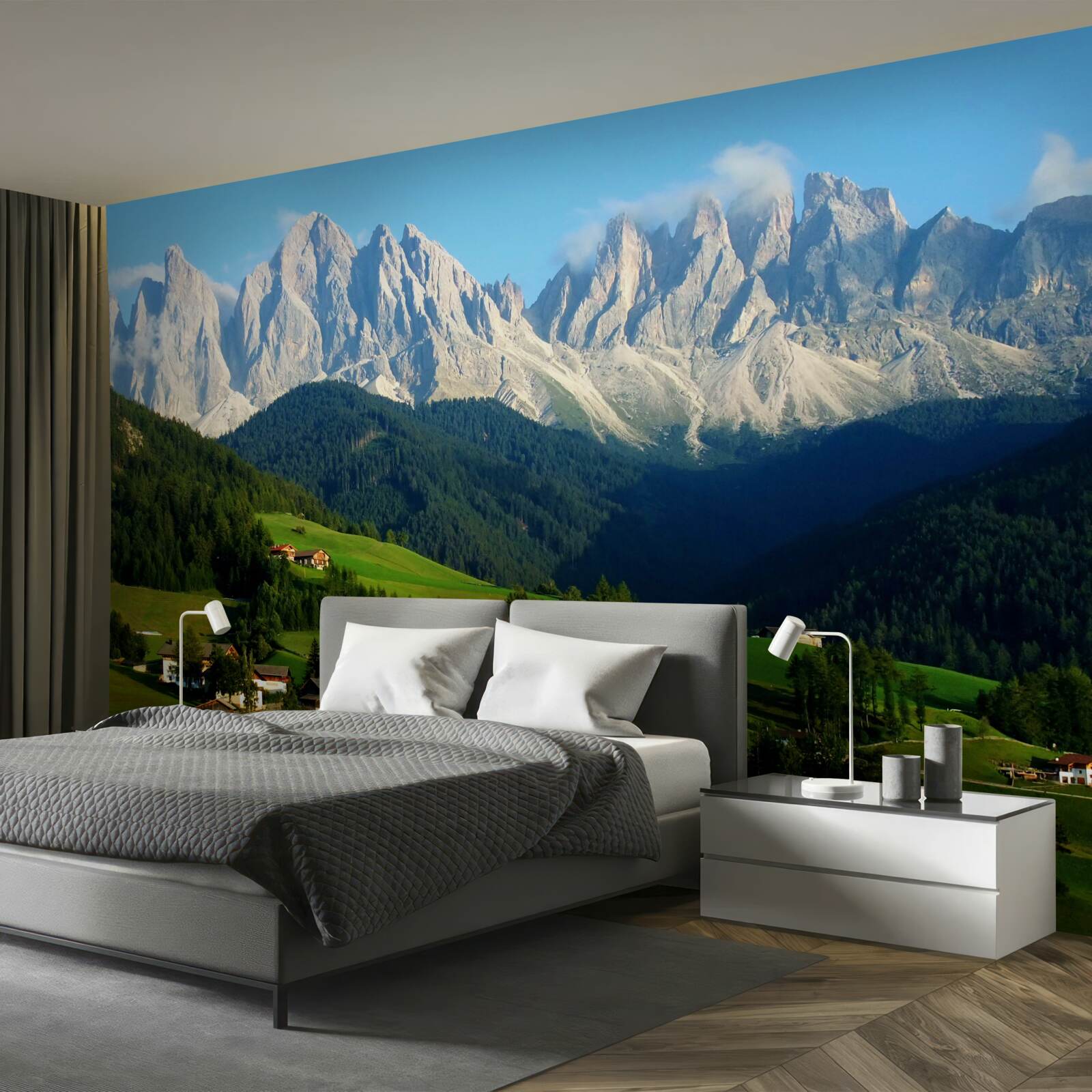 Papier peint village dans une clairière au pied des montagnes