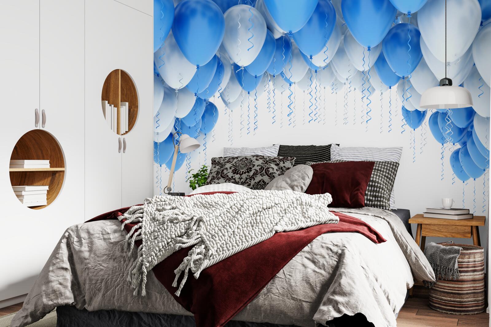 Papier peint des boules blanches et bleues flottent dans l'air