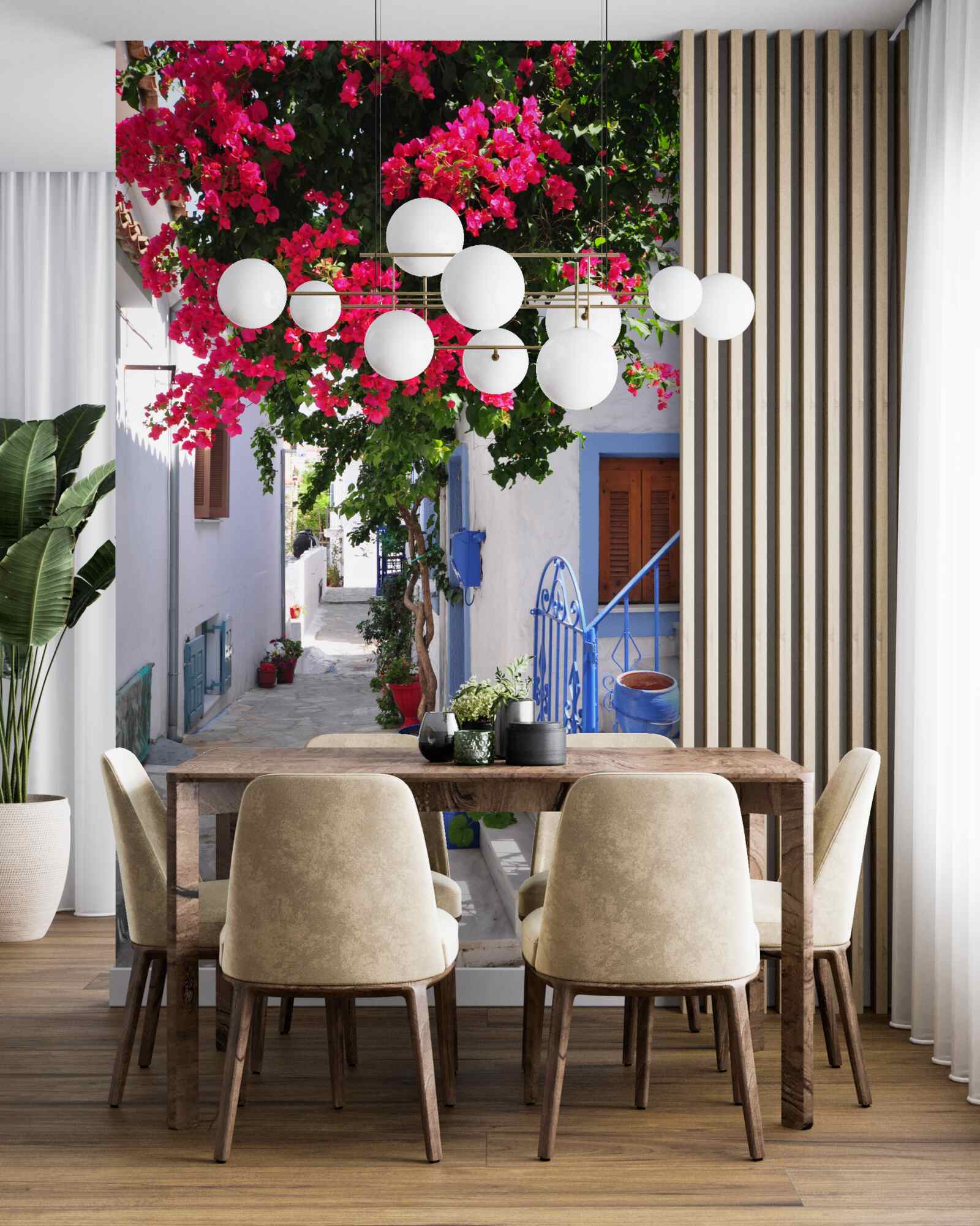 Papier peint En Grèce, les fleurs rouges poussent près des maisons blanches.