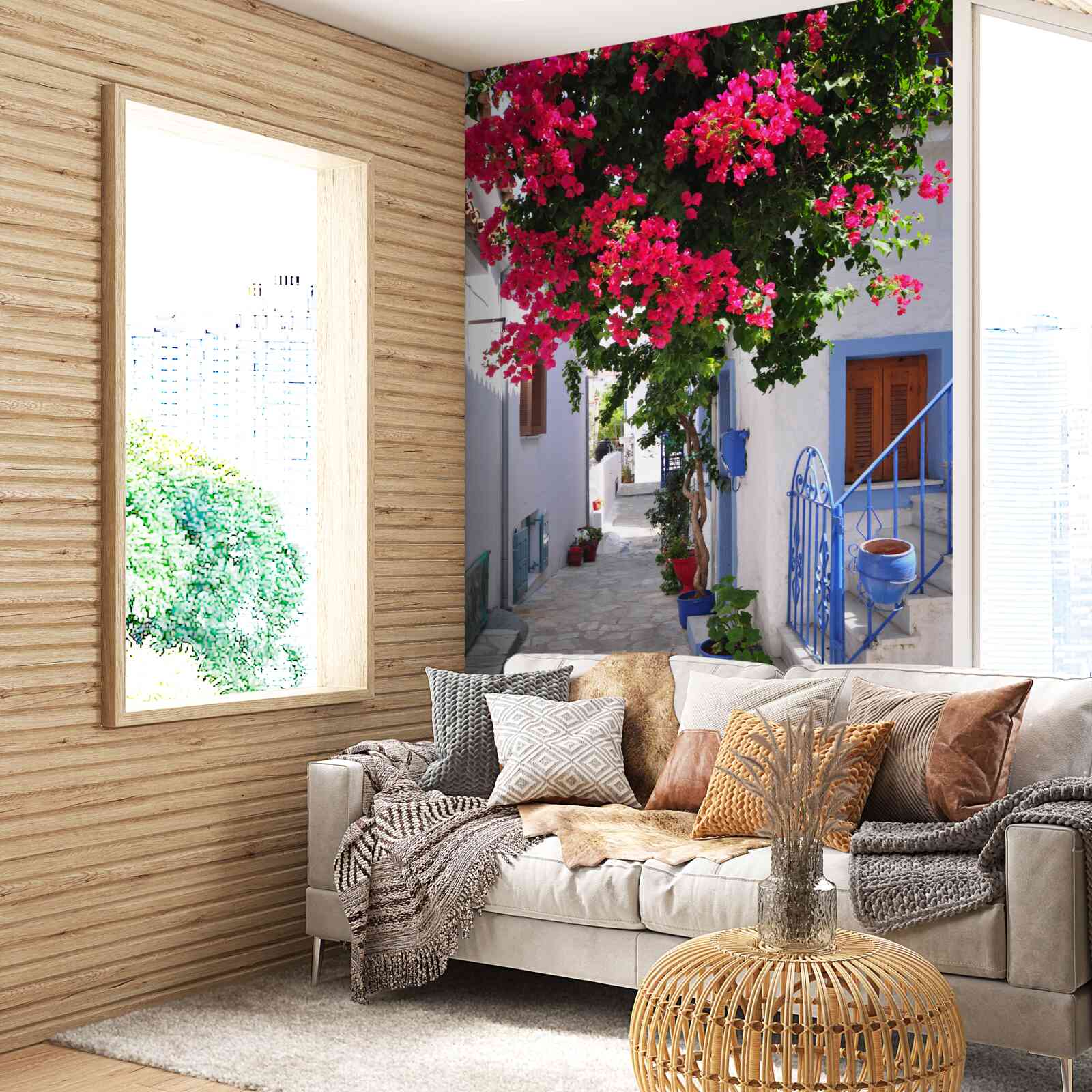 Papier peint En Grèce, les fleurs rouges poussent près des maisons blanches.