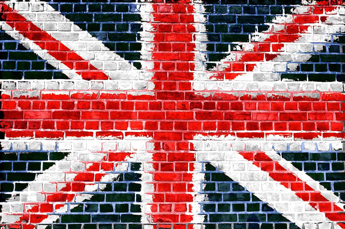 Papier peint drapeau anglais sur un mur de briques