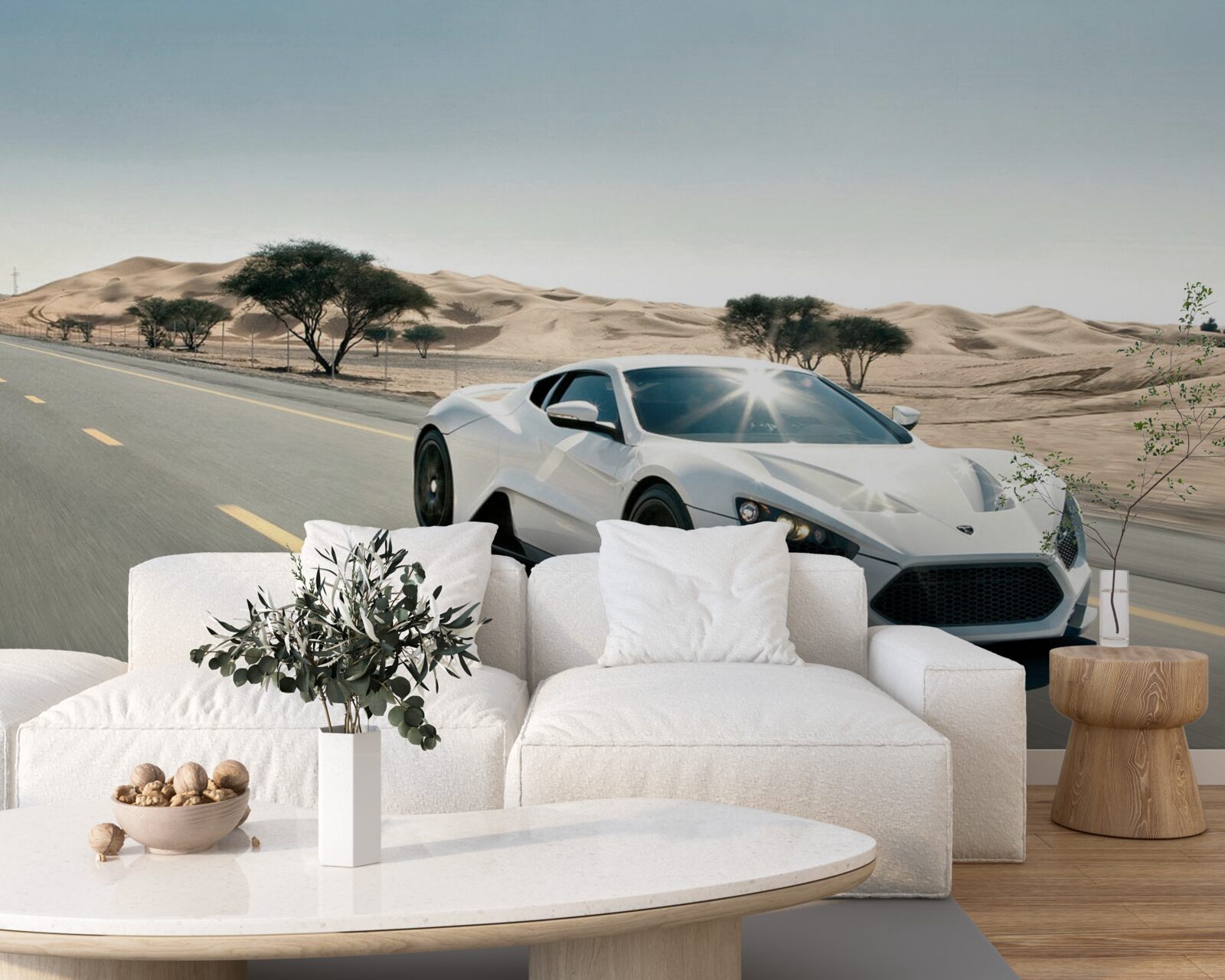 Papier peint une voiture de sport blanche roule sur une route vide