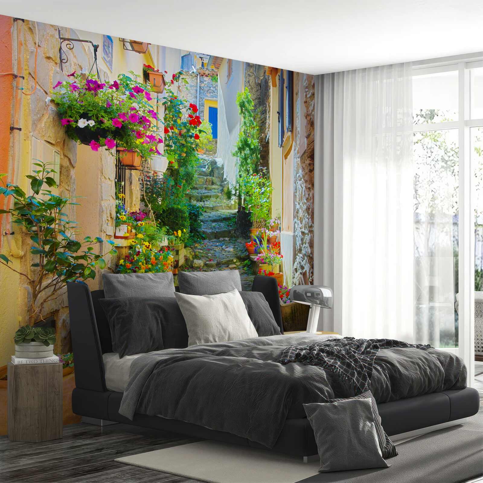 Papier peint une rue étroite et accueillante de la vieille ville, entourée de fleurs