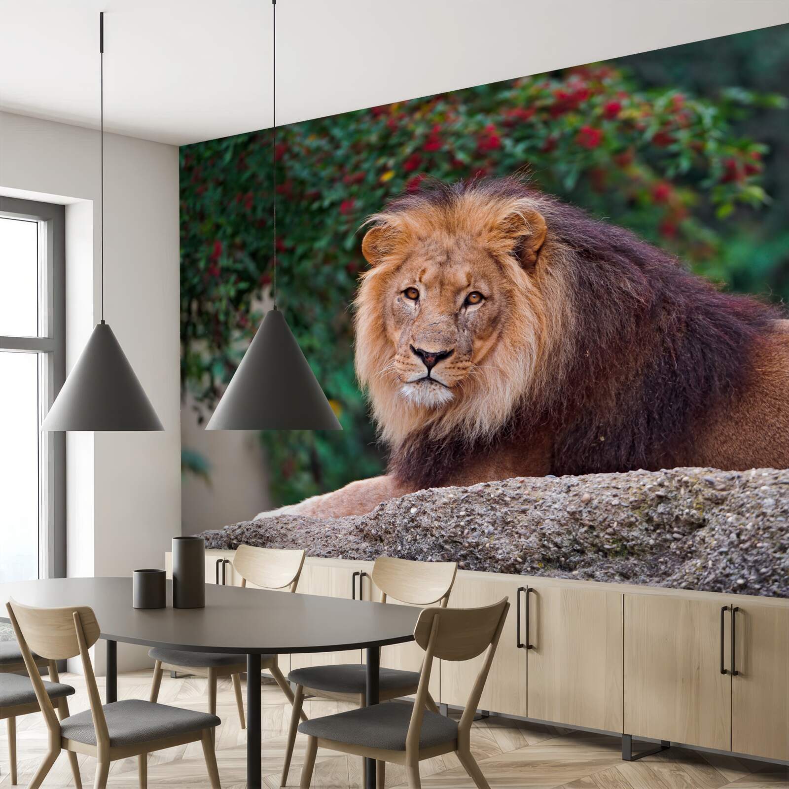 Papier peint un lion adulte s'assoit sur un rocher et attend une lionne