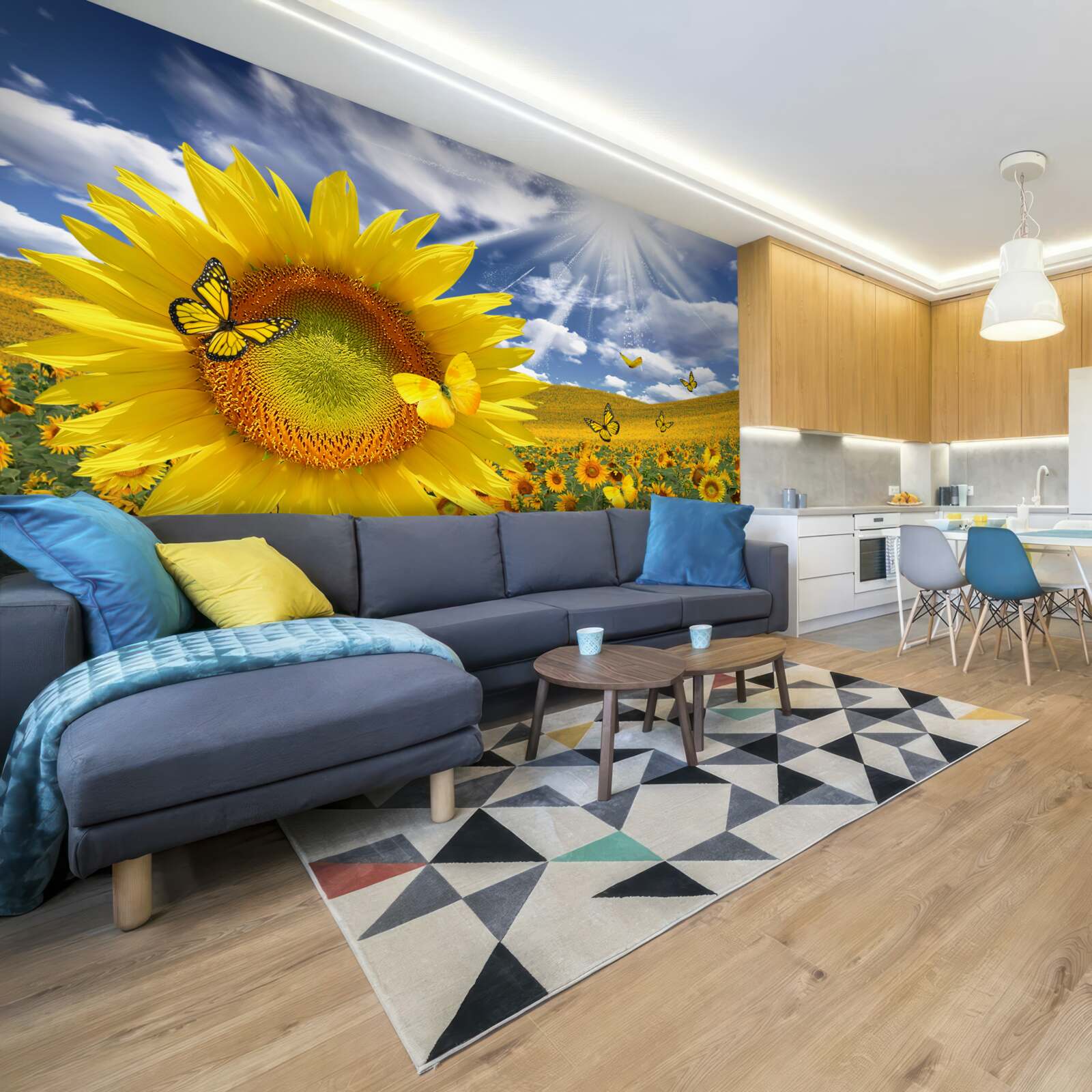 Papier peint des papillons dorés flottent dans le ciel bleu au-dessus d'un champ de tournesols