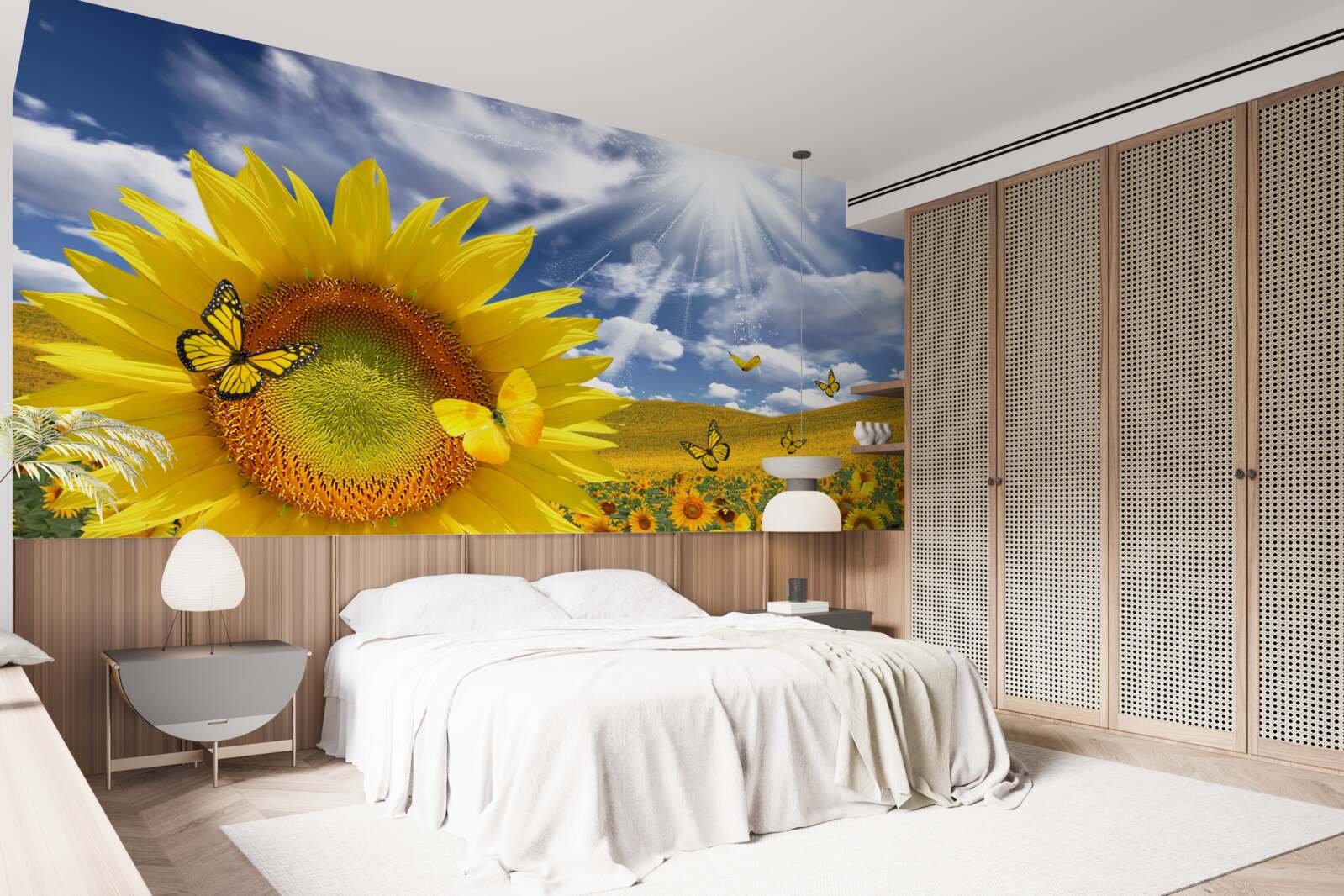 Papier peint des papillons dorés flottent dans le ciel bleu au-dessus d'un champ de tournesols