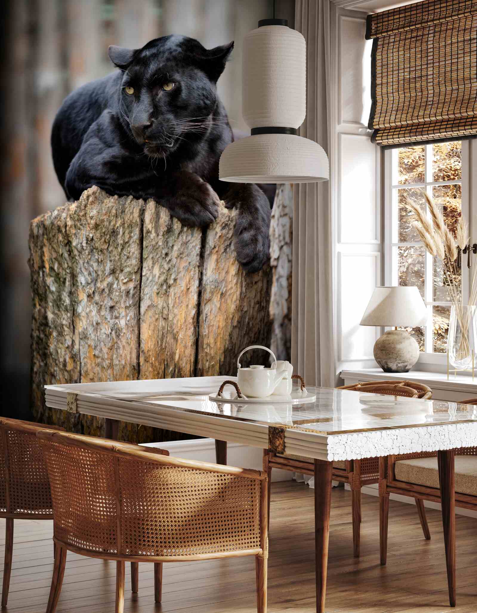 Papier peint une panthère noire est assise sur un arbre