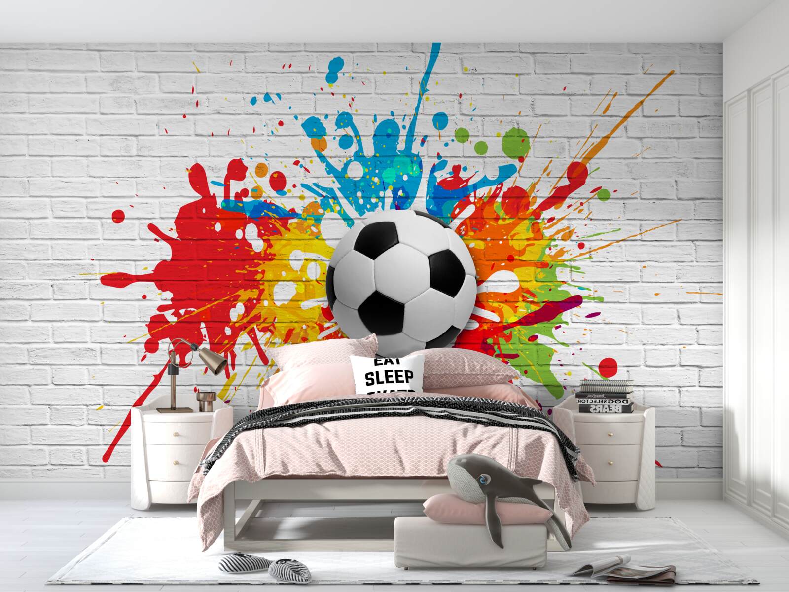Papier peint il y a un ballon de football sur le mur de briques