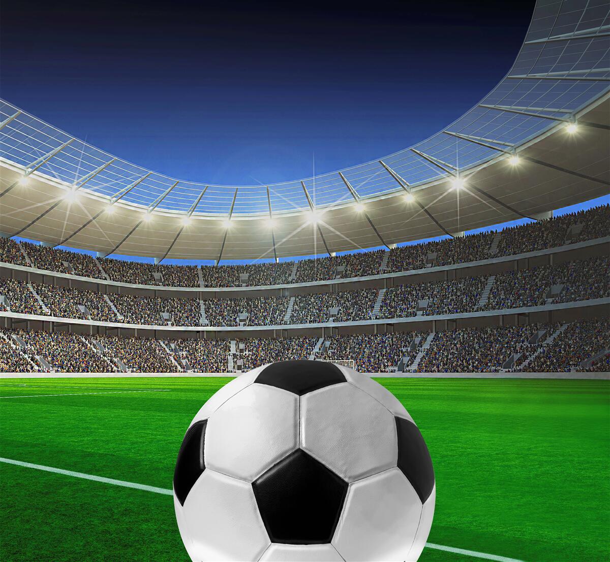 Papier peint dans l'arène, il y a un terrain de football avec un ballon