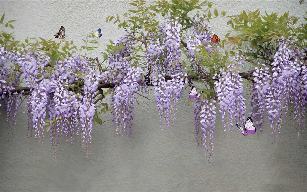 Papier peint une branche avec des fleurs de lilas et des papillons qui voltigent