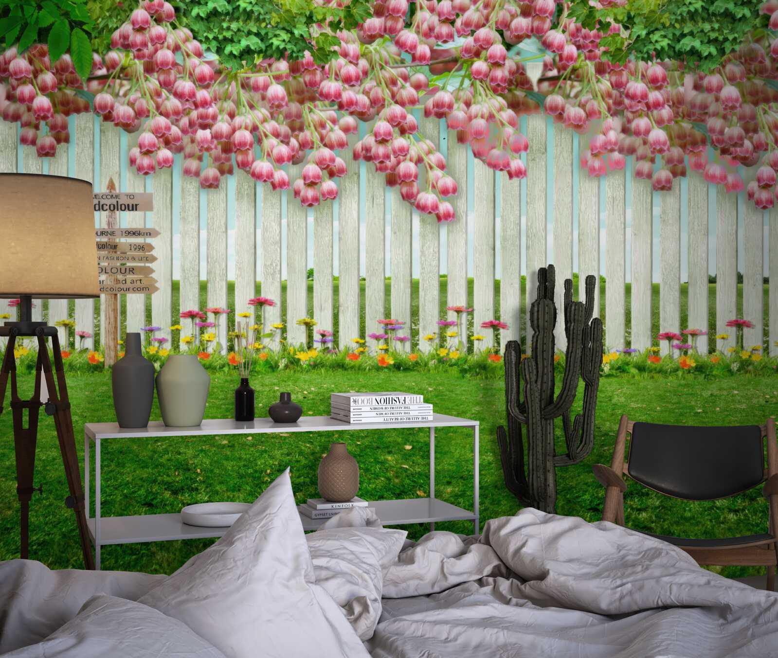 Papier peint des fleurs roses tombent en cascade sur une clôture blanche