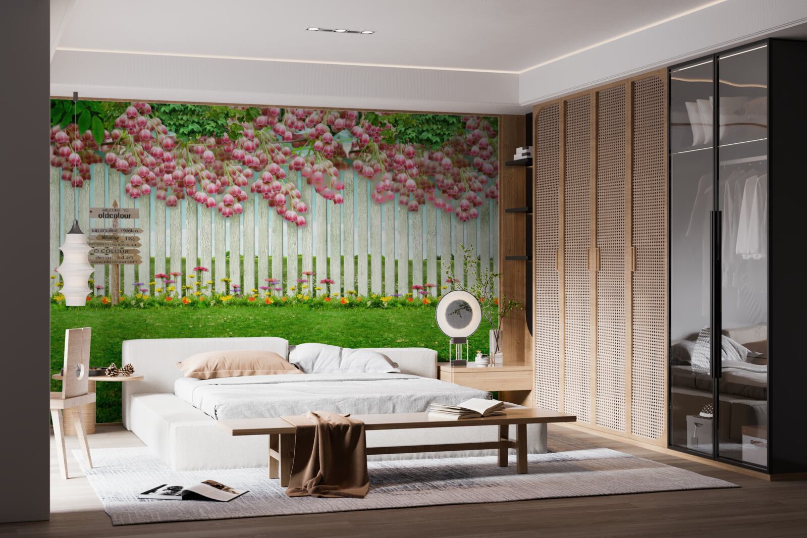 Papier peint des fleurs roses tombent en cascade sur une clôture blanche