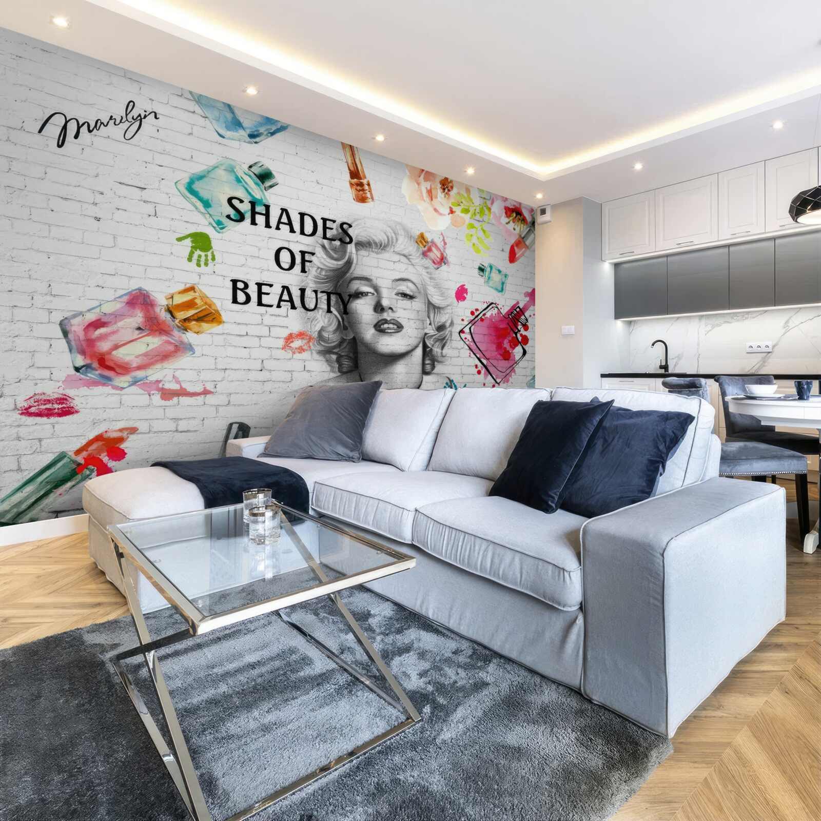 Papier peint monroe contre un mur de briques blanches