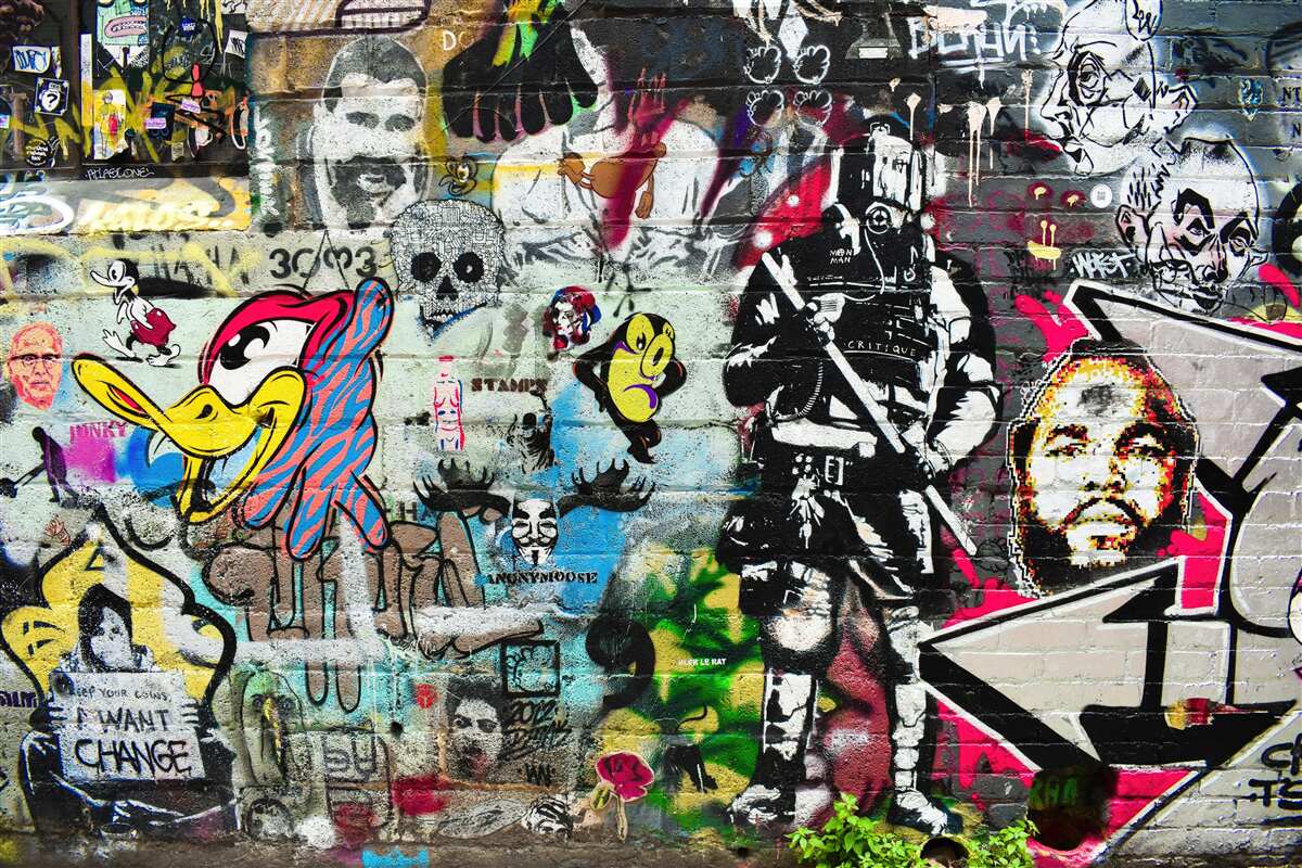 Papier peint Mur décoré de graffitis