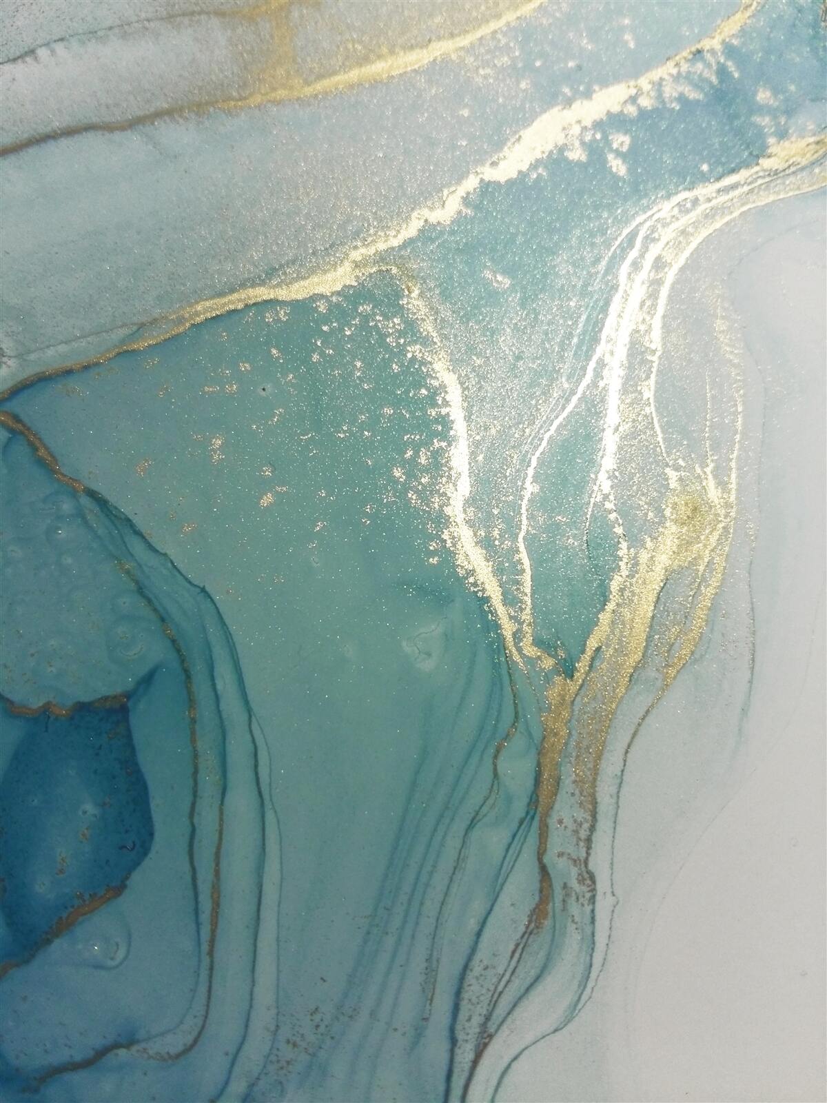 Papier peint or avec turquoise