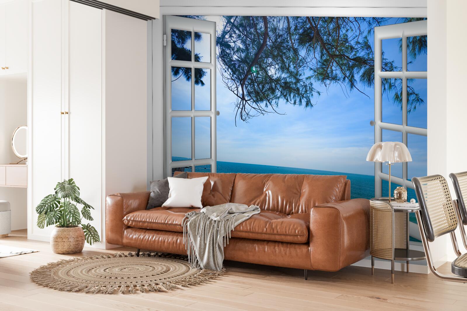 Papier peint une fenêtre sur la mer bleue