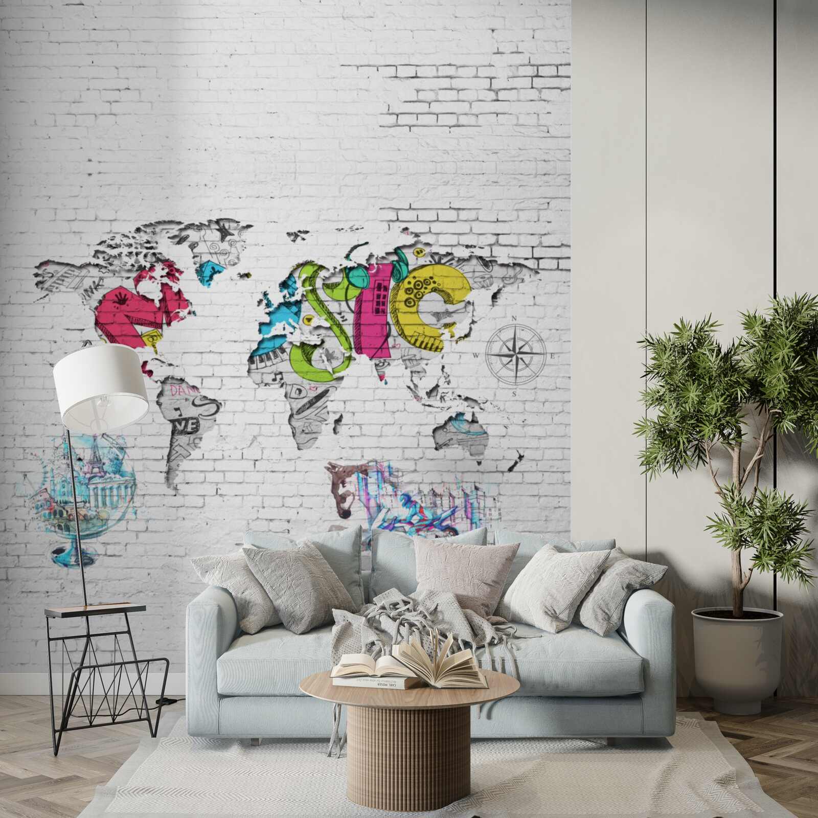 Papier peint carte du monde en différentes couleurs sur un mur blanc