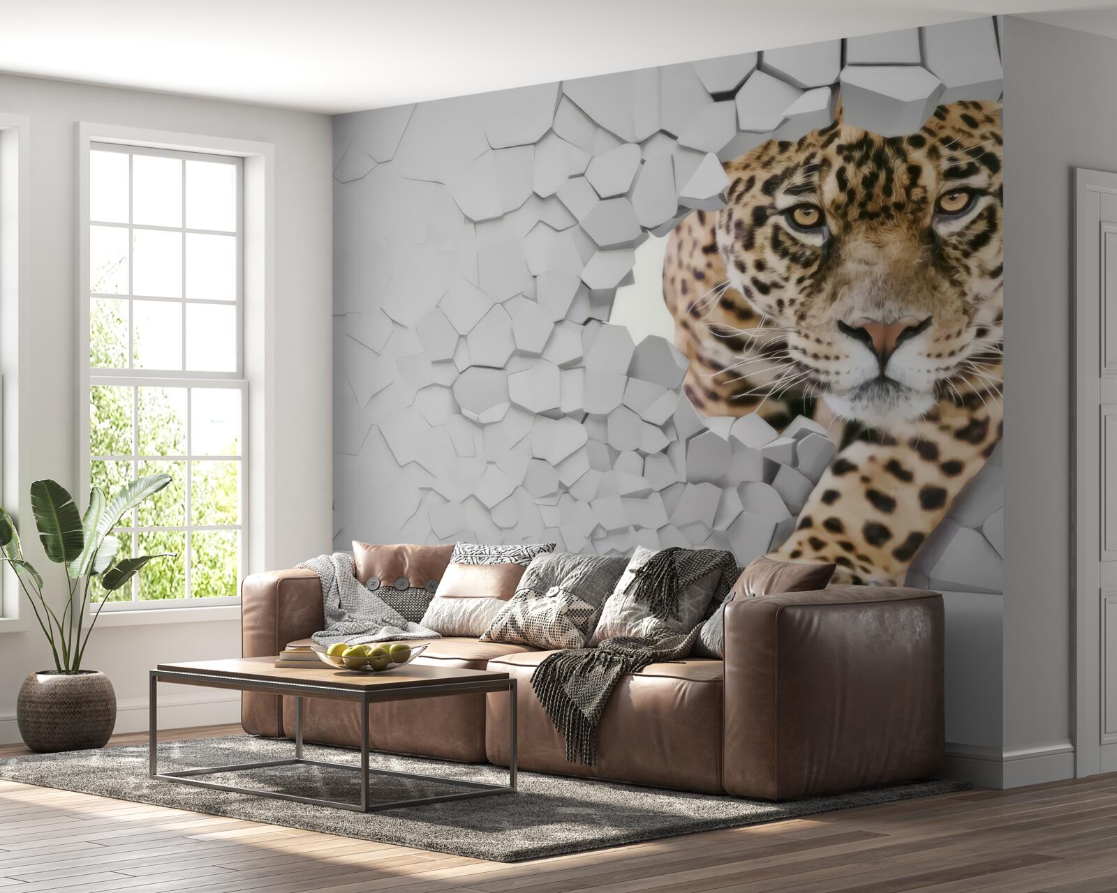 Papier peint un léopard émerge d'un mur blanc