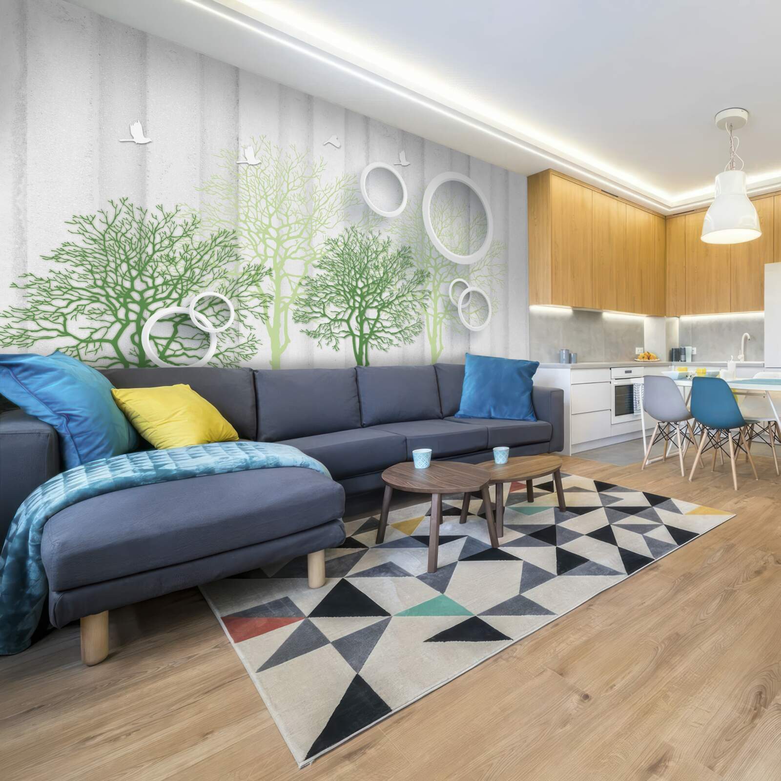 Papier peint des arbres élancés aux feuilles vertes et aux cercles blancs comme neige