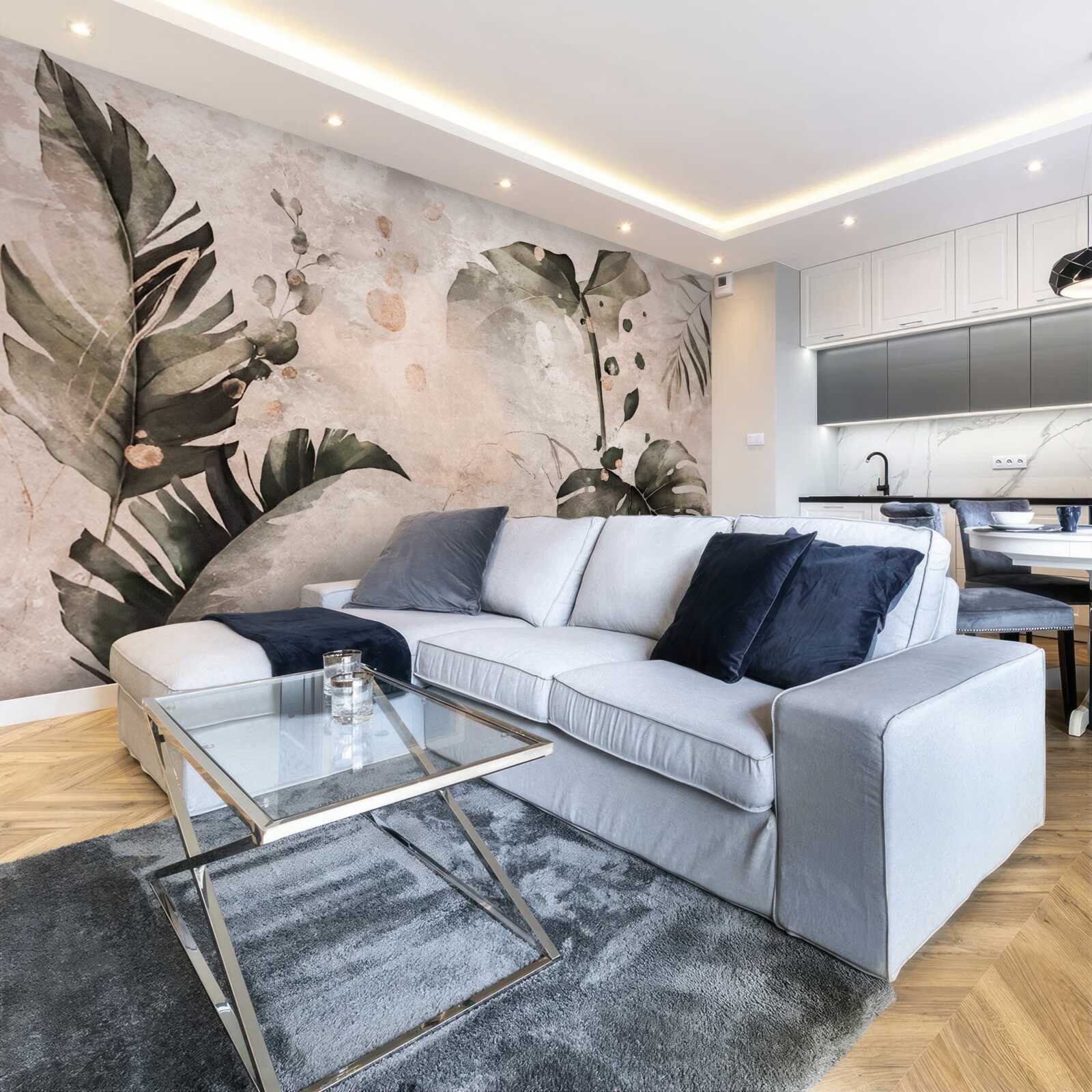 Papier peint aquarelles représentant de grandes feuilles tropicales