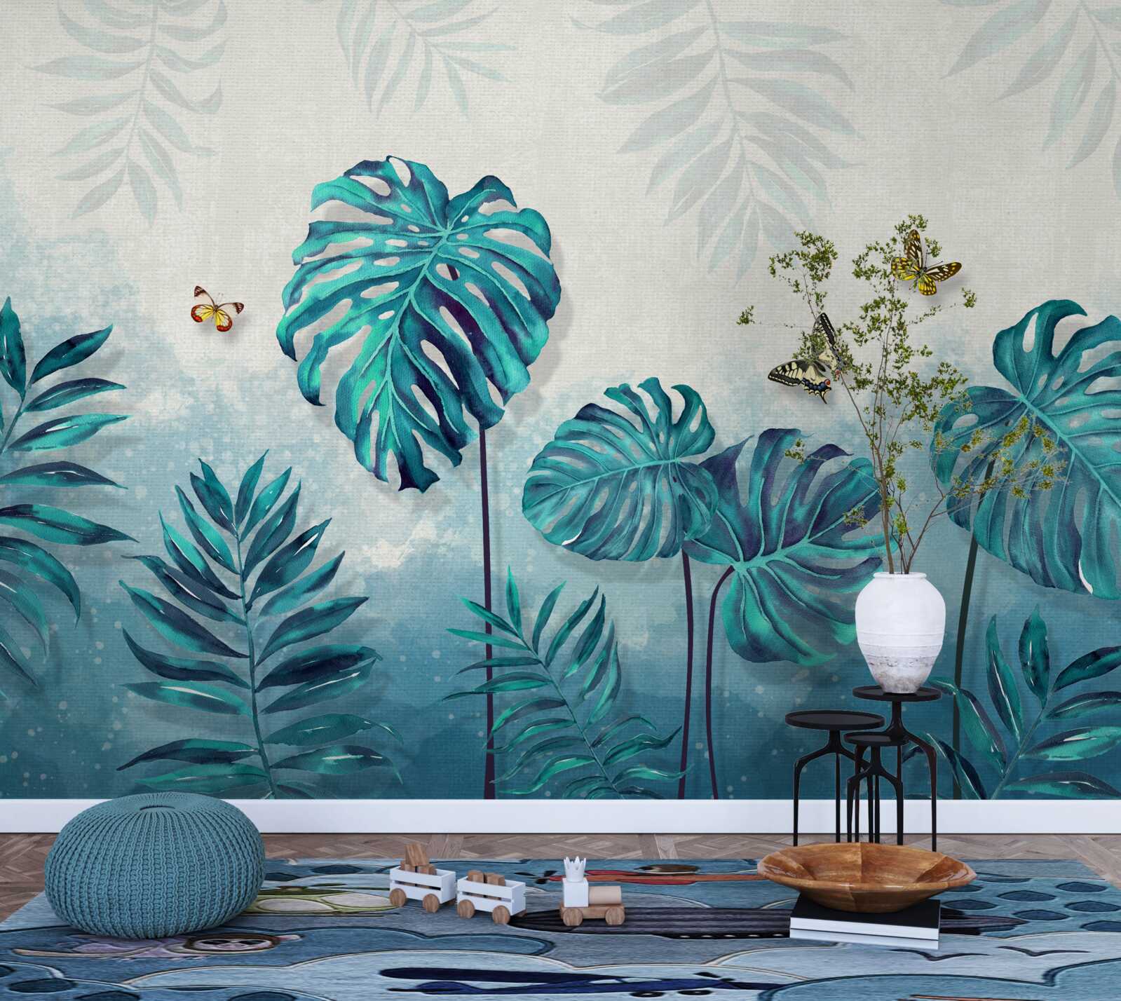 Papier peint les feuilles de monstera sont bleues, décorées de papillons
