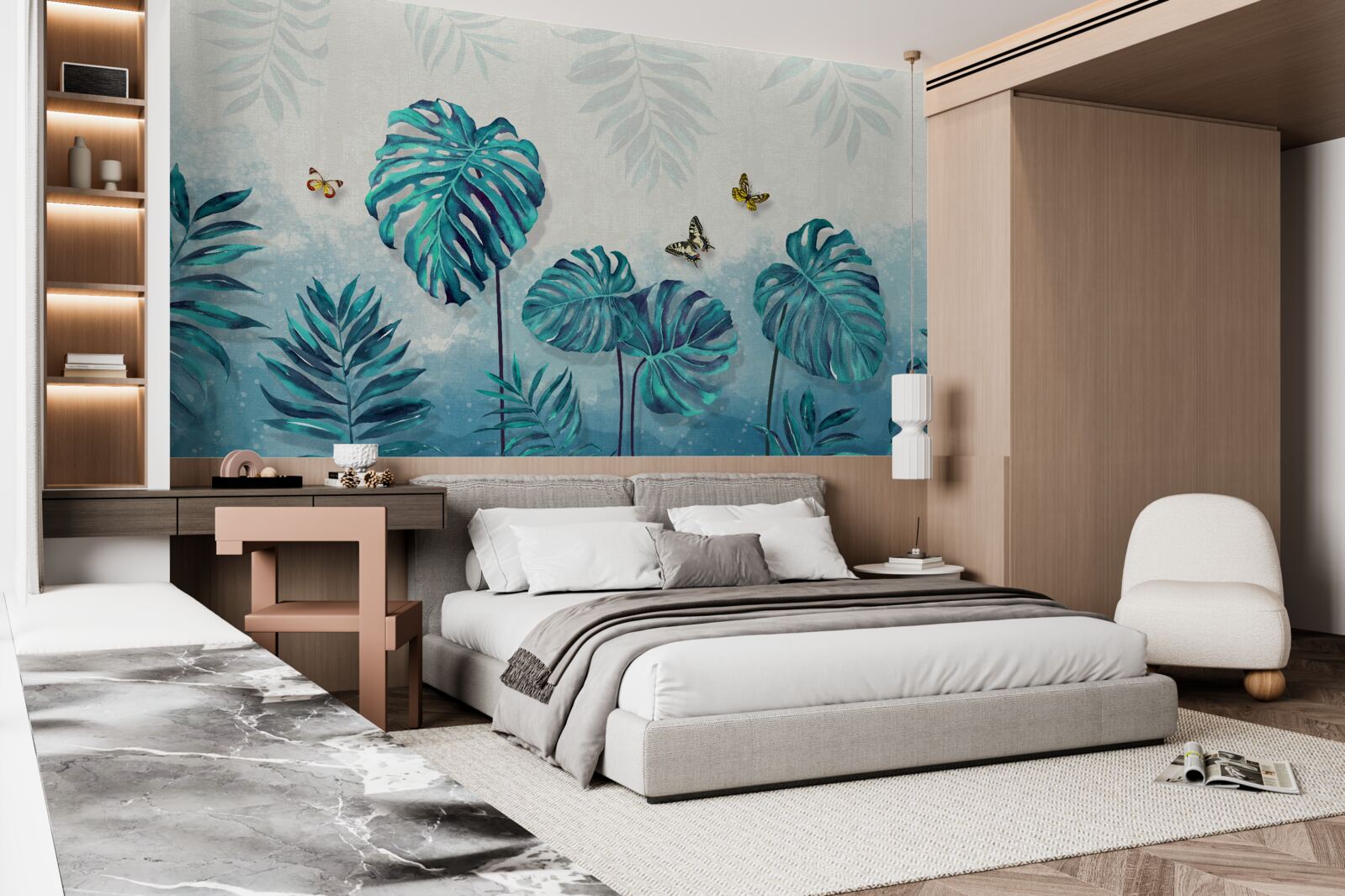 Papier peint les feuilles de monstera sont bleues, décorées de papillons