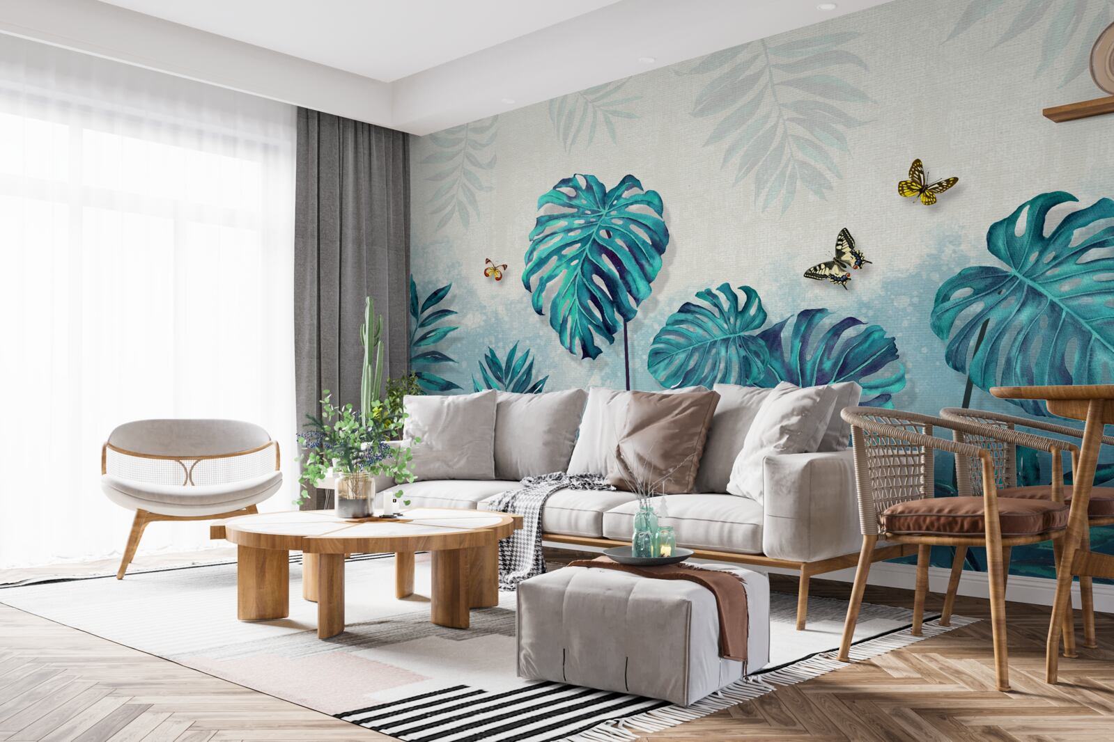 Papier peint les feuilles de monstera sont bleues, décorées de papillons